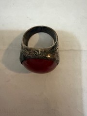 vintage silver dome-style cocktail ring featuring a prominent, smooth red caboch