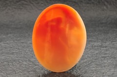 Vintage shape shell cameo, “Woman Sitting on a Terrace” (52.5ct), sign by artist