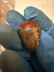 vintage silver dome-style cocktail ring featuring a prominent, smooth red caboch