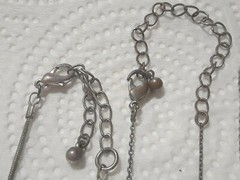 Lot of silver tone chain necklaces with rhinestone pendants. Coin, Love + Luck