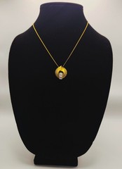 Vtg Gold-tone necklace ring pendant with trio of baguette-cut rhinestones