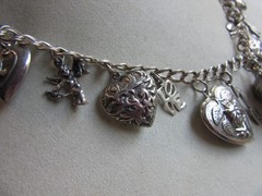 Vintage double link chain necklace with 22 heart, love themed charms 61.8 grams