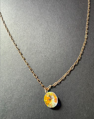 Swarovksi necklace with iridescent pendant on gold chain