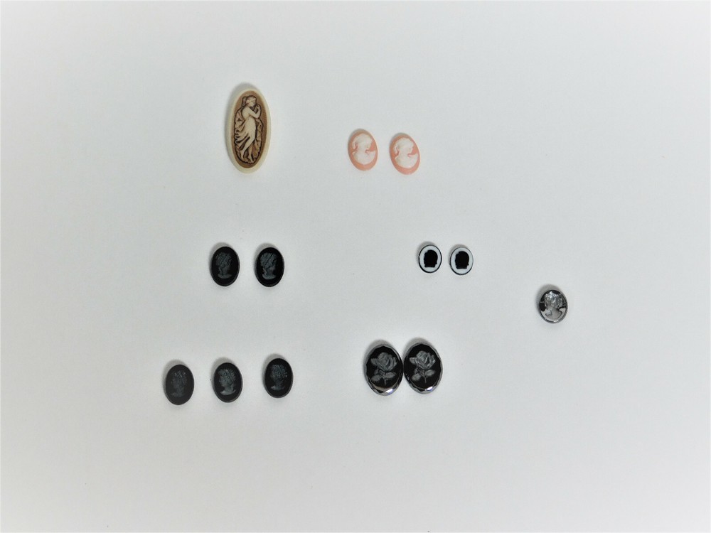 A Collection of 13 Cameos in Different Sizes