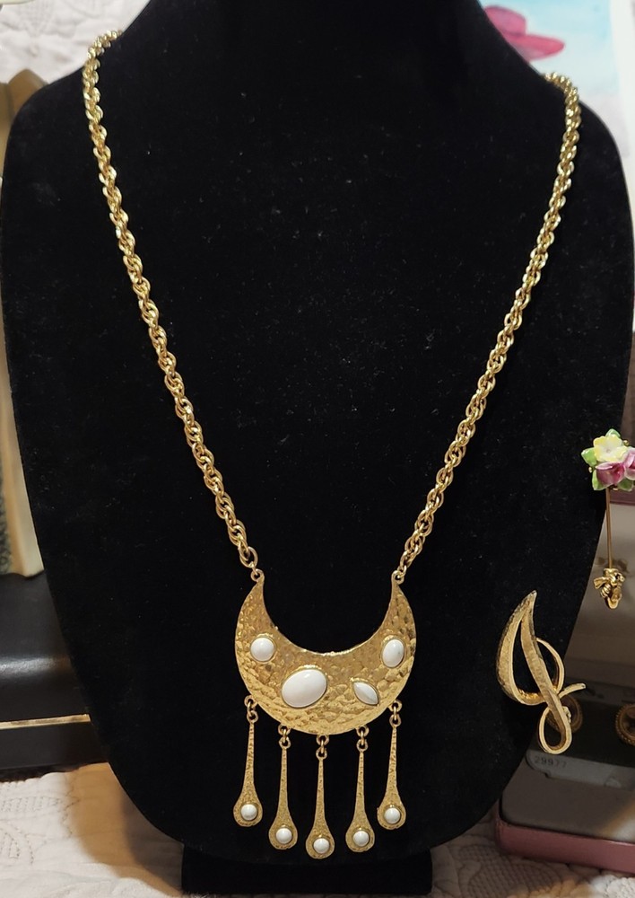 Vintage gold-toned necklace Crescent moon pendant with a hammered finish.