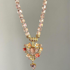 Pink beaded vintage sleeping angel pendant necklace