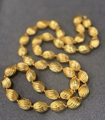 Signed Crown Trifari Vintage Gold Tone Ribbed Oval Bead Opera Long Necklace