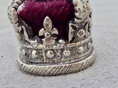 VINTAGE SILVER PLATE CROWN CHARM RED MATERIAL & SILVER 1 1/8″ MINIATURE CROWN