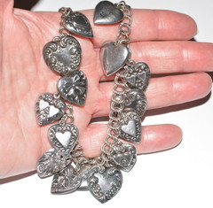 Signed PAJ 925 repousse multiple heart charms necklace 58 grams 24 inches long