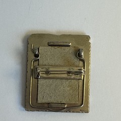 vintage pewter grandma frame brooch features a decorative border of roses and he