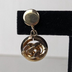 Vintage gold tone earrings knot design screw back