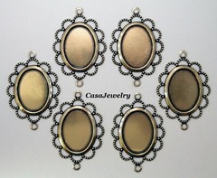 #3056 ANTIQUED GOLD FLAT LACY BORDERED 18×13 BEZEL W/2 HANG RINGS – 6 Pc Lot