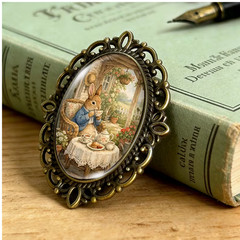 BROOCH- Rabbit’s Tea Party Brooch Oval Lace-Edged Glass Brooch