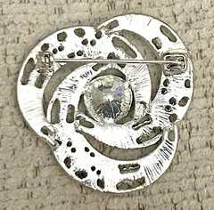 Silvertone Swirl Rhinestone Pin Brooch Blue Stones