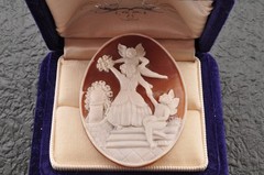 Vintage oval shell cameo, “Girl and angel”, (45.5ct) sign by artist with case.