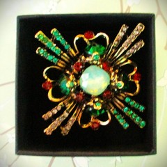 large brooch gold tone with faux opal + red, green &clear zircons